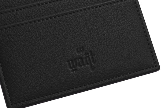Black Waqt card holder wallet with multiple card slots and sleek design, suitable for carrying essential cards compactly.