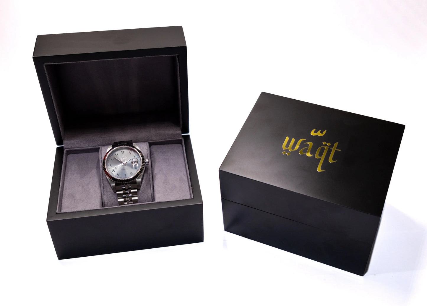 Luxury watch displayed inside open grey suede box – presentation for an elegant unboxing experience
