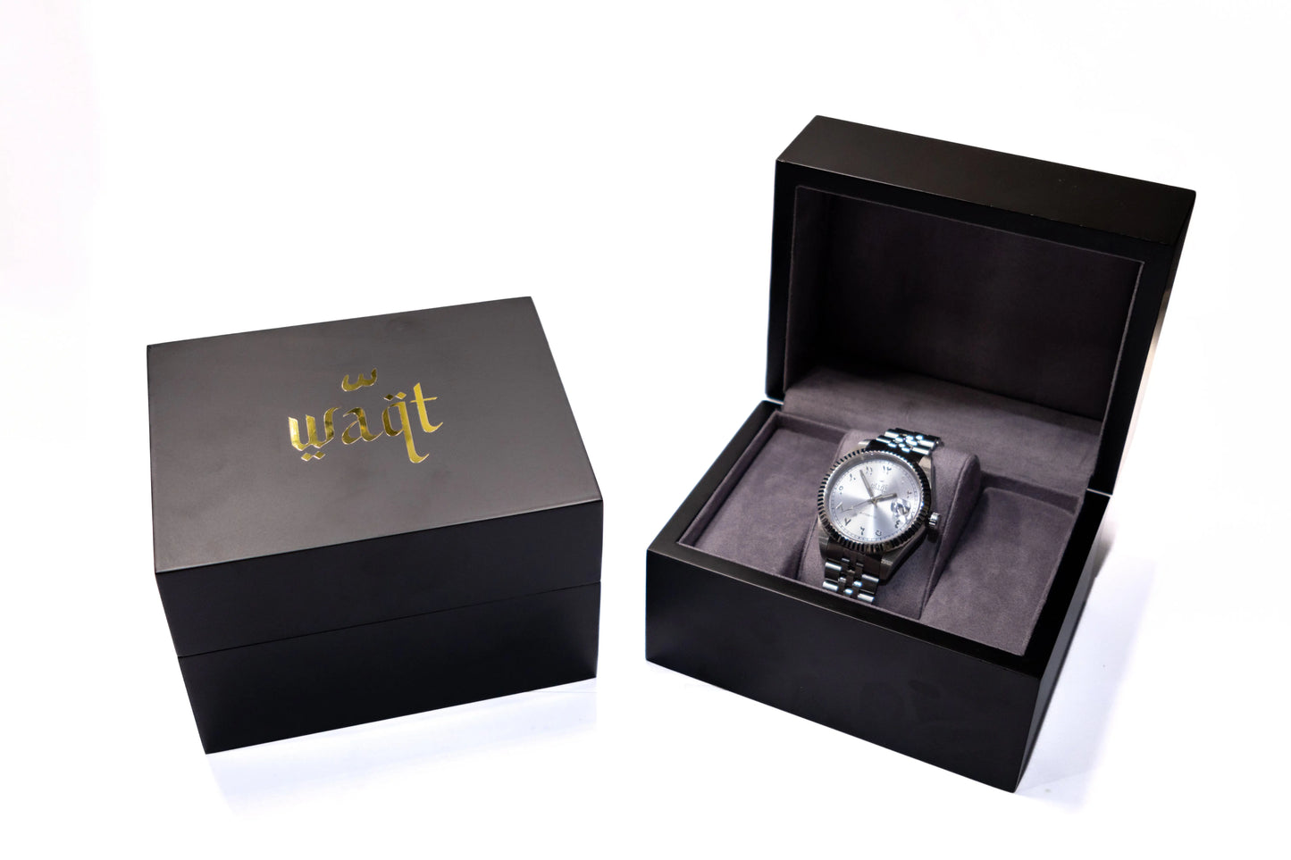Luxury watch displayed inside open grey suede box – presentation for an elegant unboxing experience