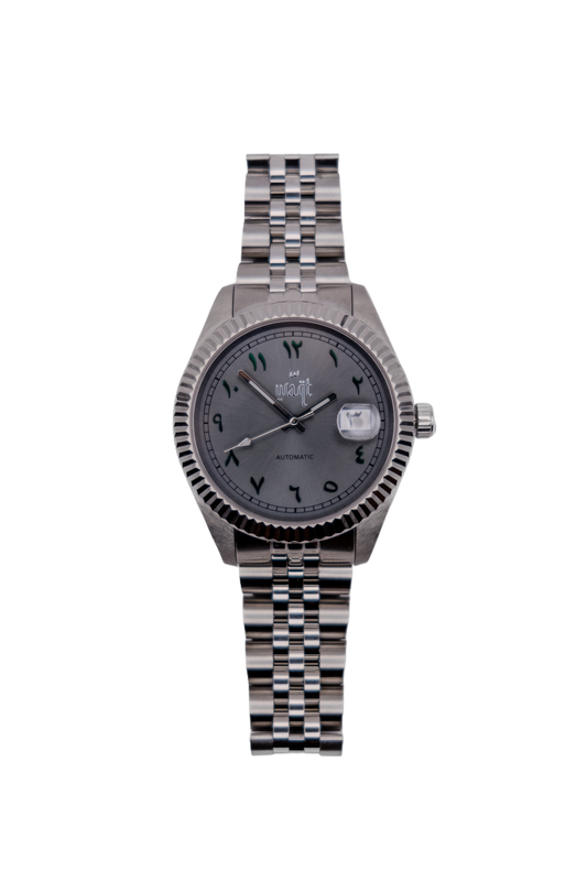 Luxury Grey Green watch with Arabic numerals, date wheel, and automatic movement – front view