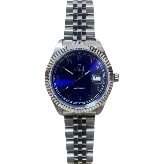 Luxury Ocean Blue watch with Arabic numerals, date wheel, and automatic movement – front view